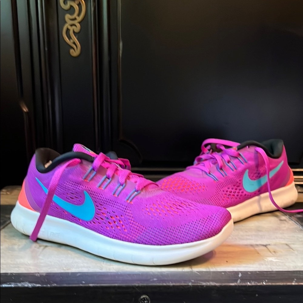Nike Pink and Blue Athletic Shoes Vibrant Design